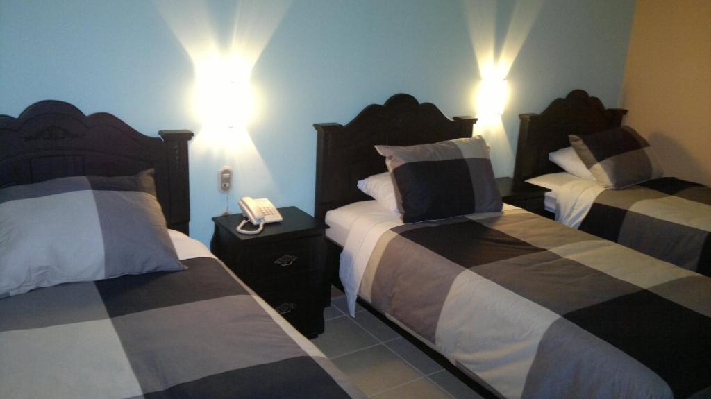 Hotel Eskalima Alajuela Phòng bức ảnh